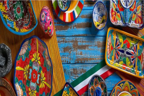 Vibrant handcrafted Mexican pottery in traditional colours